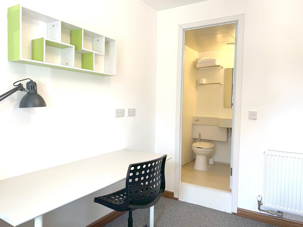 A bright, clean study area featuring a minimali...