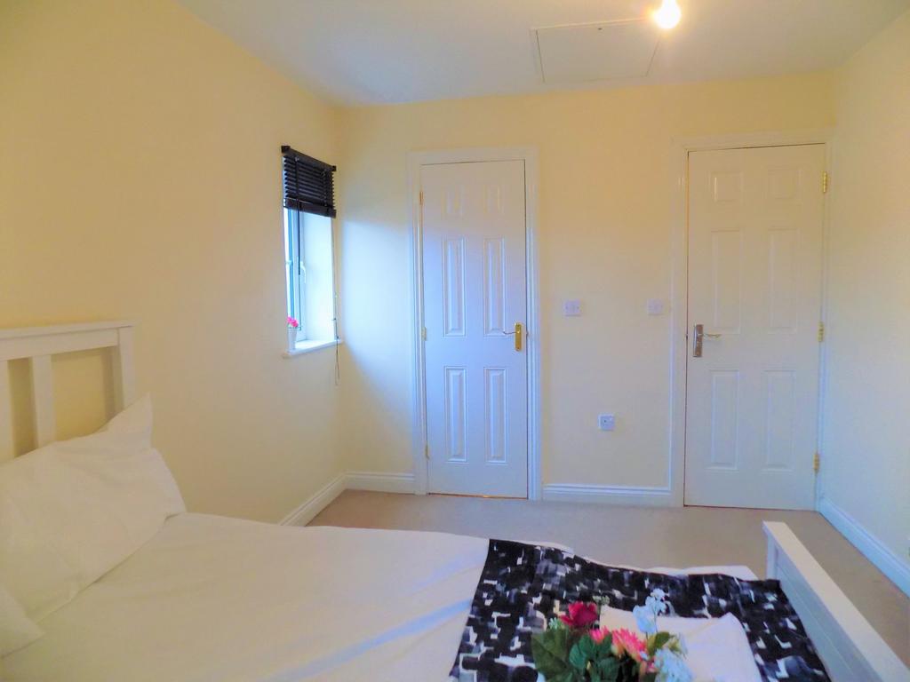 Bright and clean double bedroom featuring soft ...
