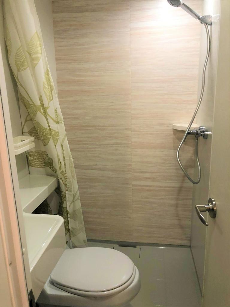A neat and well-maintained bathroom featuring a...