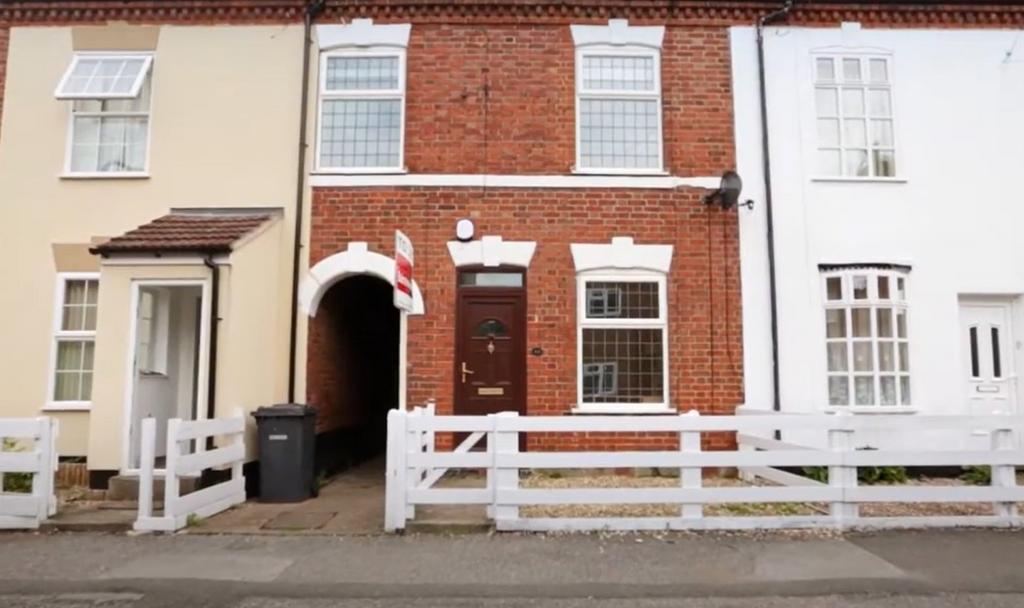 A charming terraced brick house with a traditio...