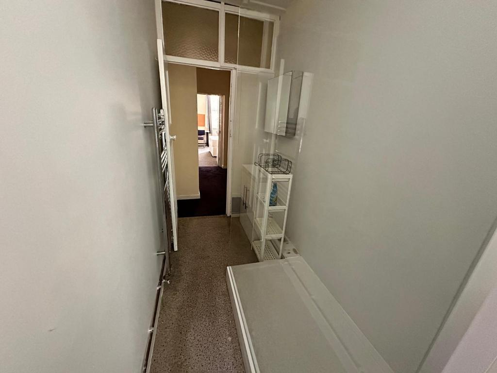 A tidy and well-maintained hallway that provide...