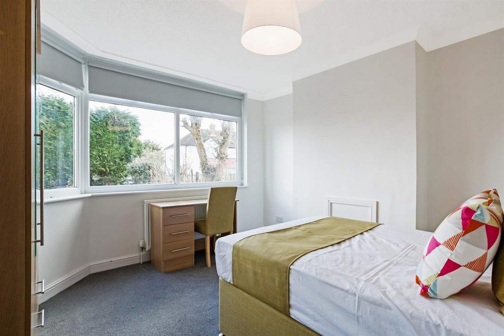 Bright and inviting single bedroom featuring a ...