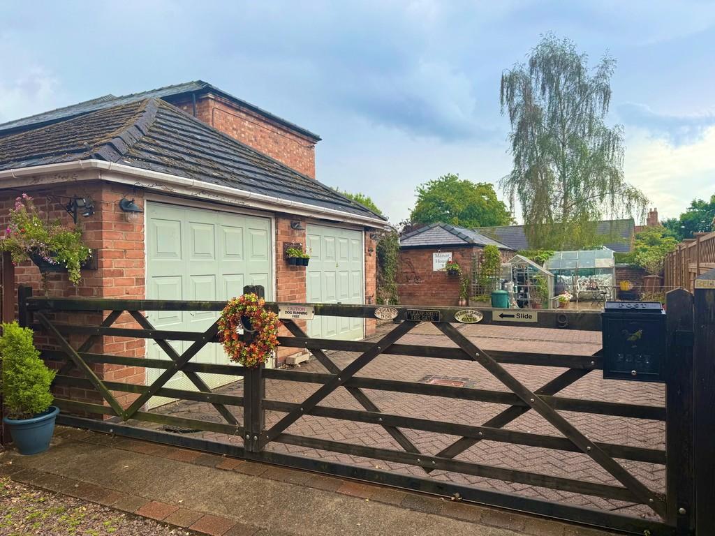 Front with garage 1