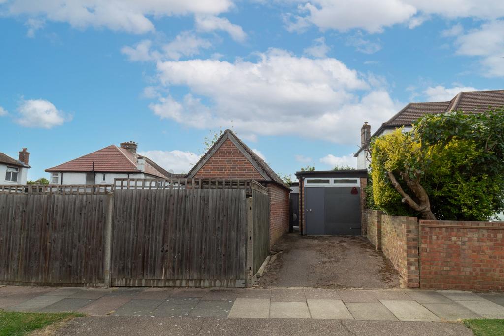 Driveway view, garage
