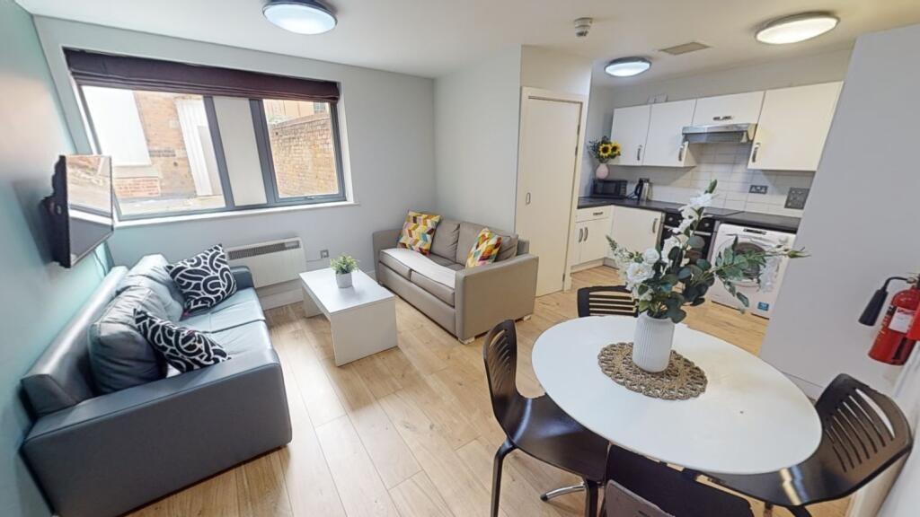 A modern and inviting living room featuring a c...
