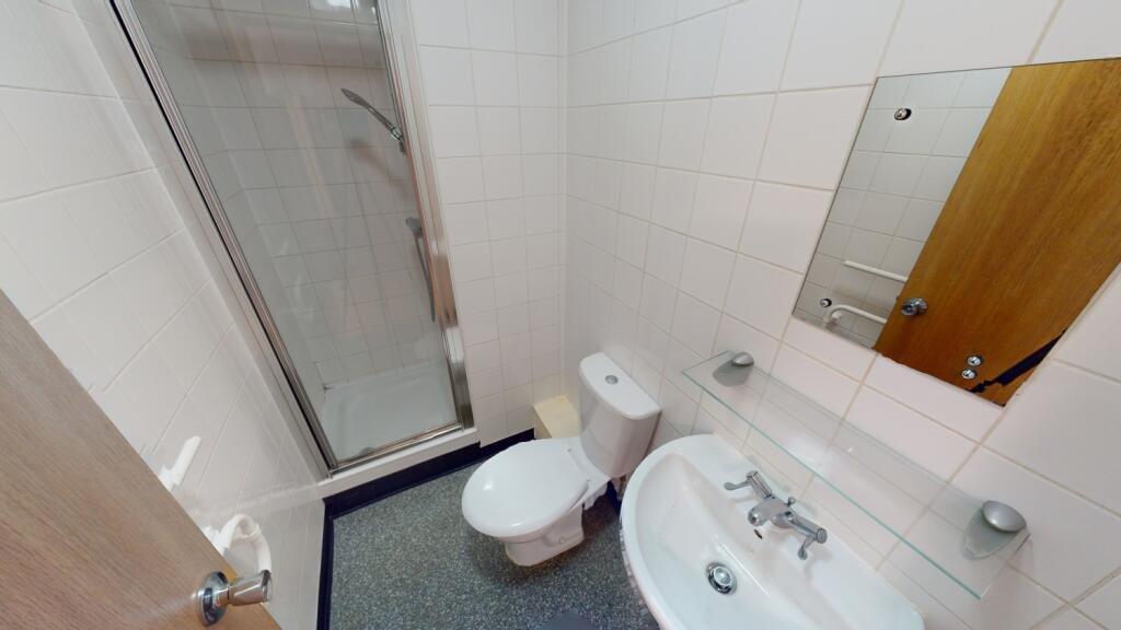 Bright and tidy bathroom featuring a clean sink...