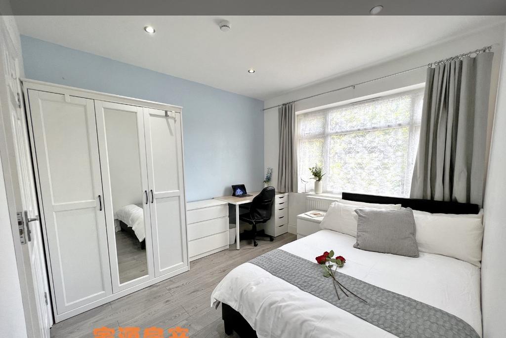 Bright and inviting master bedroom featuring a ...