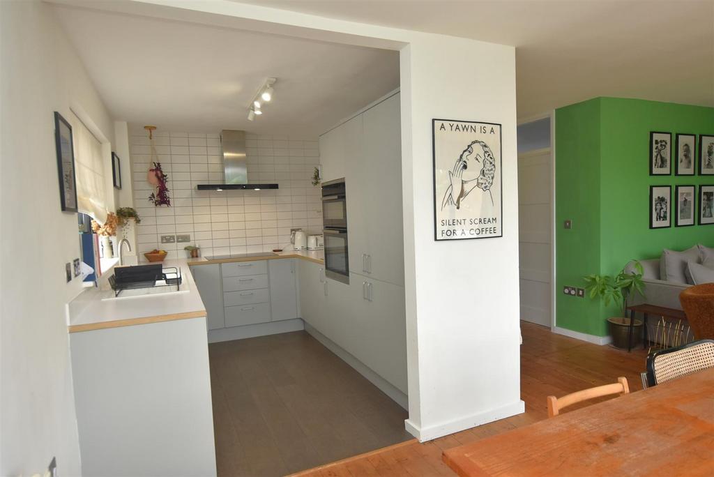 Dining Area to Kitchen