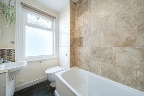 38 Abbey Road, London, SW19 2LZ