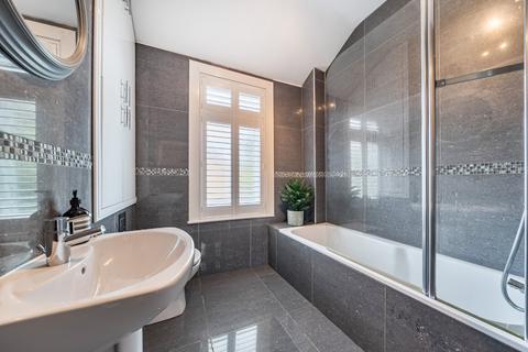 32 Mill Road, London, SW19 2NE