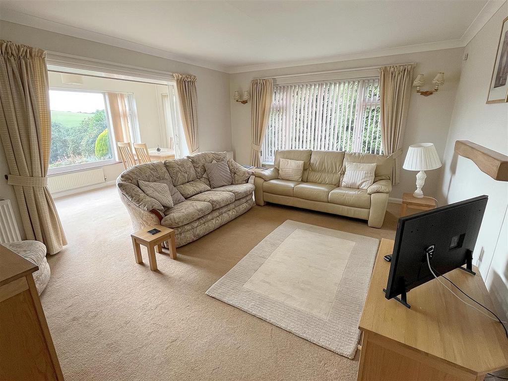 Sitting Room and Sun Lounge.jpg