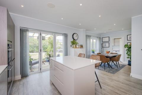 8 Bridges Avenue, East Molesey, KT8 0AP