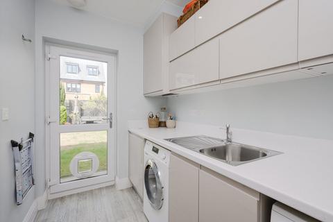8 Bridges Avenue, East Molesey, KT8 0AP