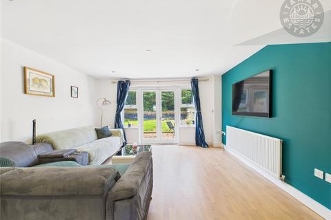 undefined, “A modern three-storey townhouse with garage, offering style and convenience in equal measure.”