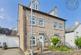 “A modern three-storey townhouse with garage, offering style and convenience in equal measure.”