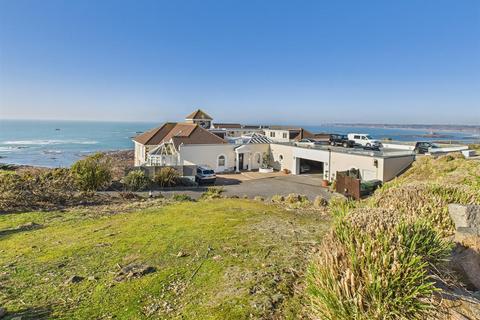 undefined, 2 Bedroom Coastal apartment with 2 parking spaces.