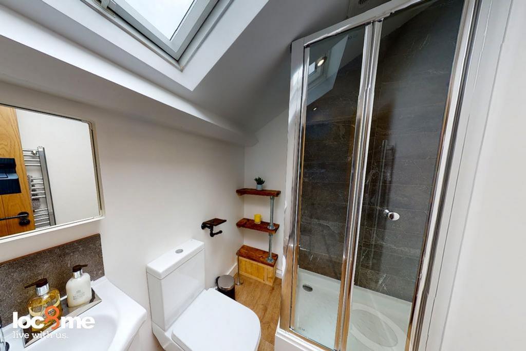 A modern and clean bathroom featuring a stylish...