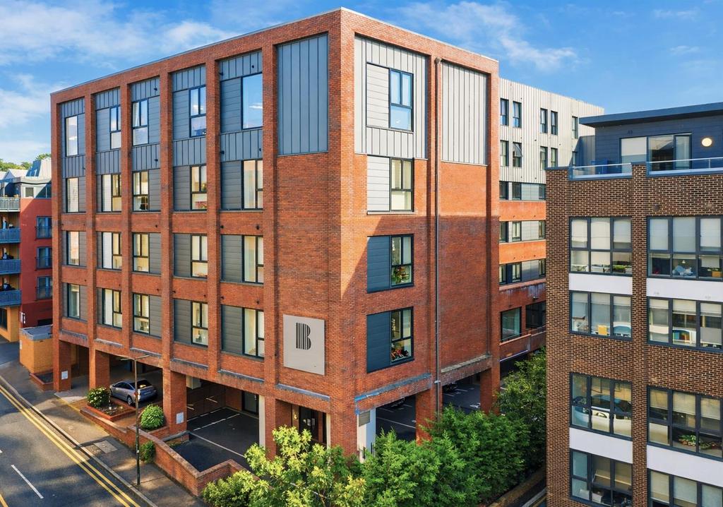 Benedicts Apartments in vibrant city setting.png