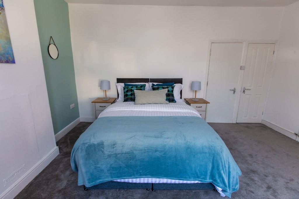 A spacious and well-decorated large double bedr...