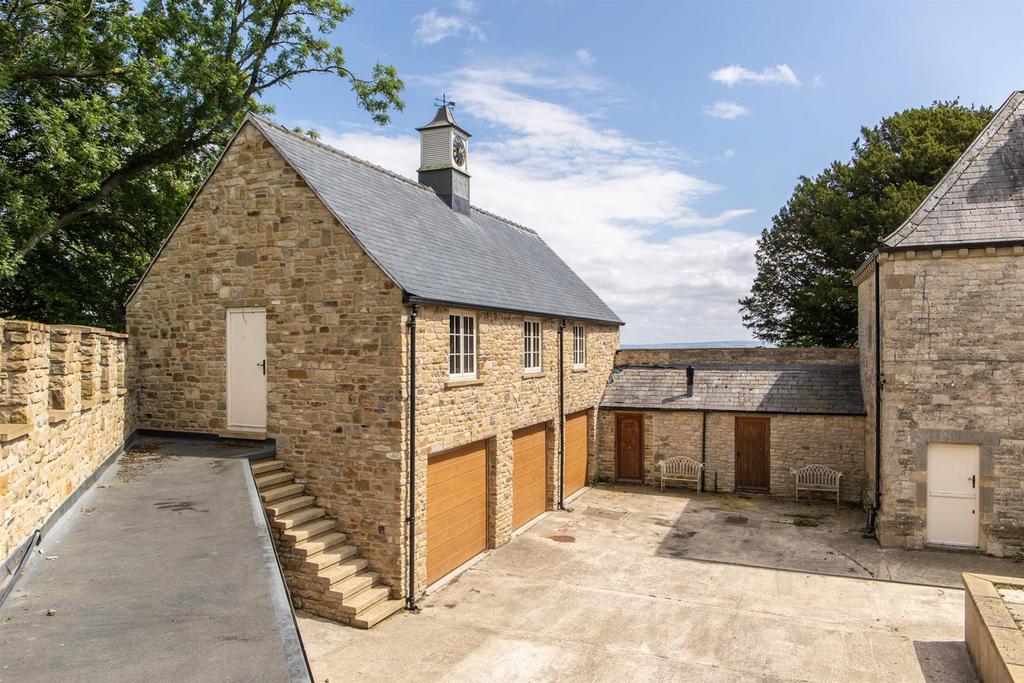 3-bay garage in Courtyard. Staff flat over.