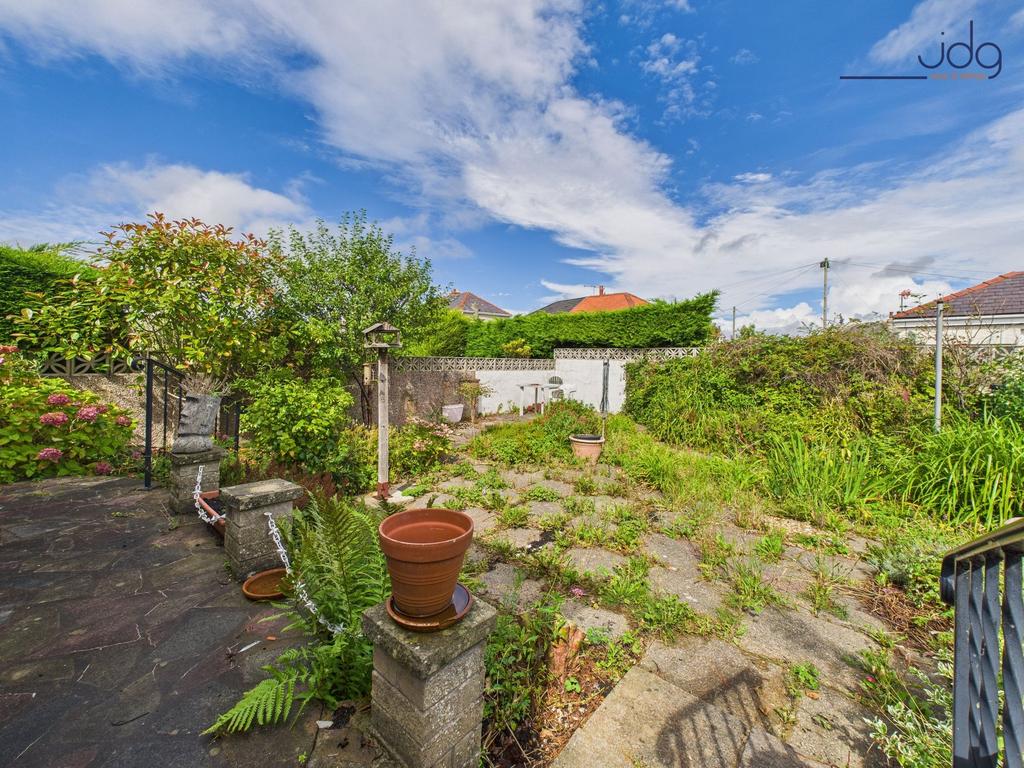 Flagged Garden with Entrance to the Detached...