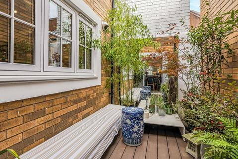 undefined, Laurence Mews, London W12