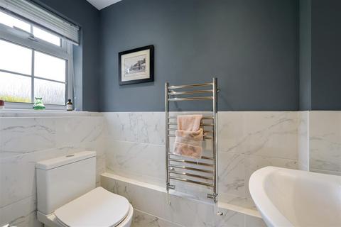3 Middle Close, Epsom, KT17 1DU