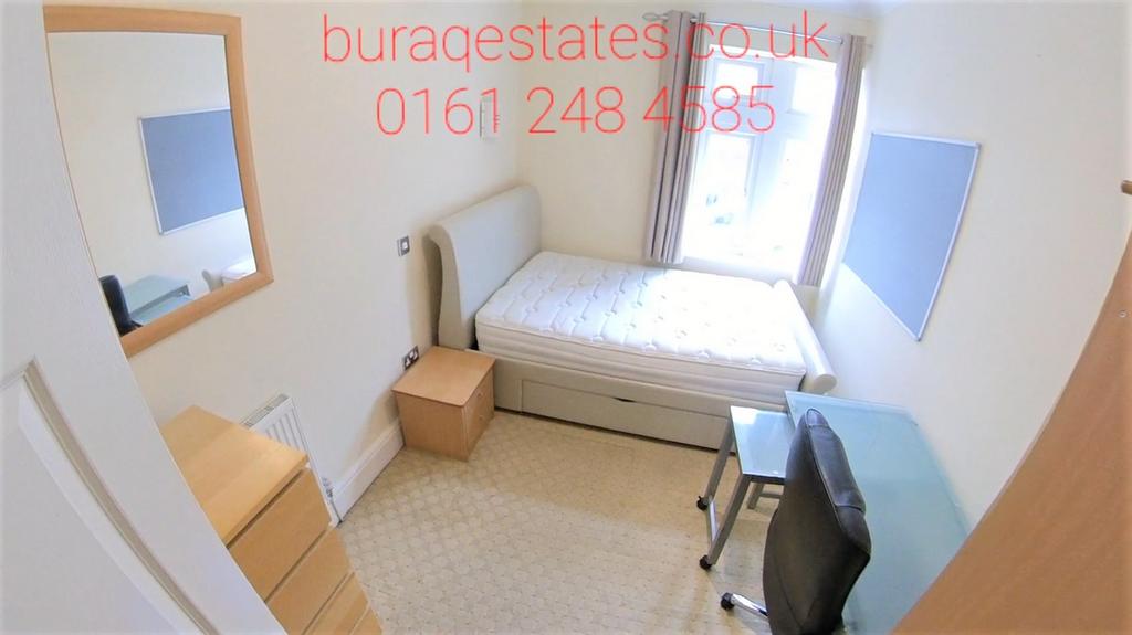 Bright single bedroom with a large window, simp...