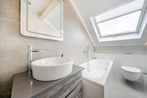 Flat 1, The Coach House, 55 Putney Hill, London, SW15 6RZ