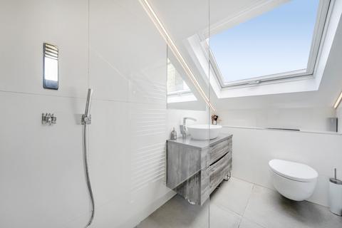Flat 1, The Coach House, 55 Putney Hill, London, SW15 6RZ