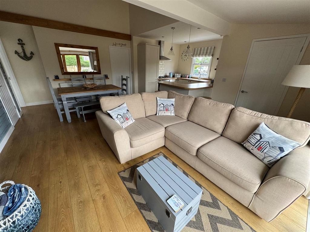 Living area, sitting, dining and kitchen