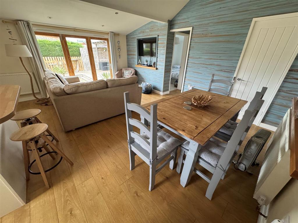 Living area, sitting, dining and kitchen