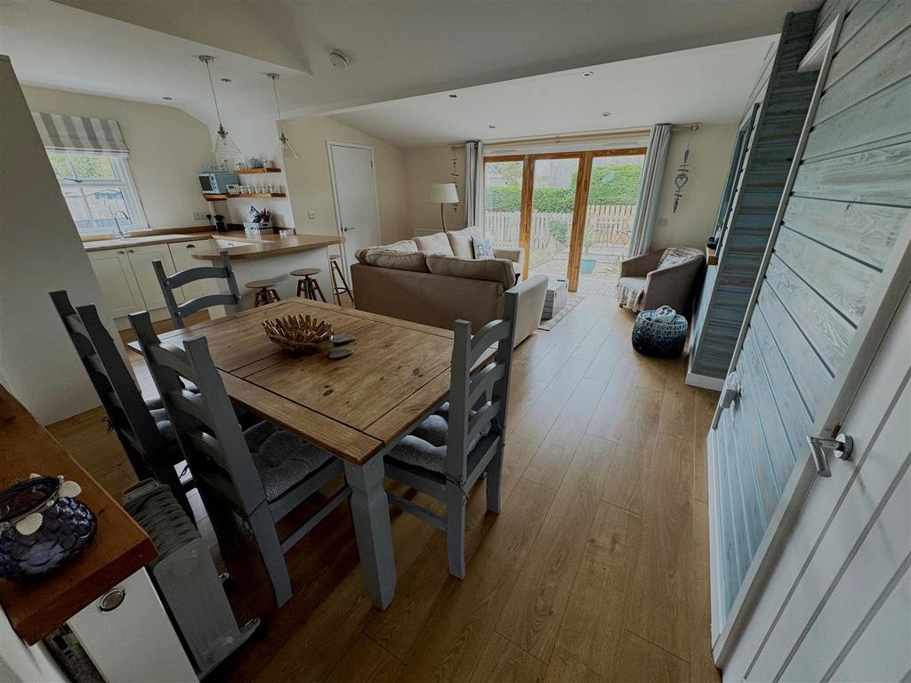 Living area, sitting, dining and kitchen