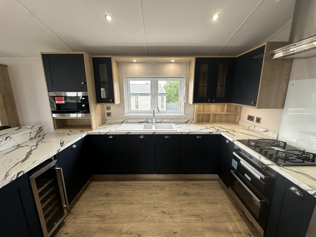 Lodge near red wharf bay kitchen