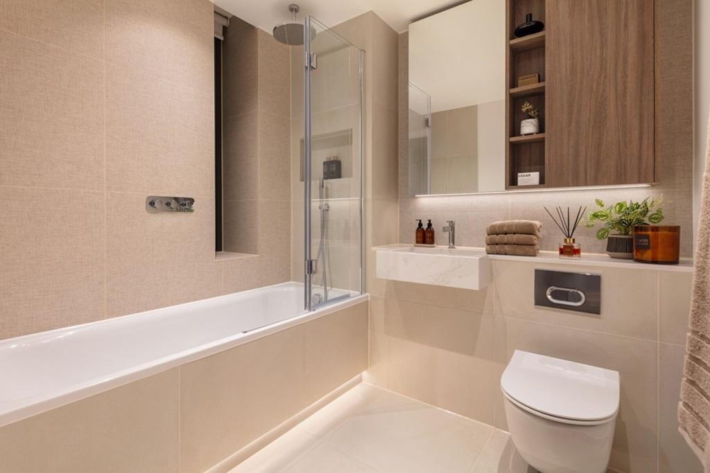 Light bathroom with bespoke vanity & cabinetry...