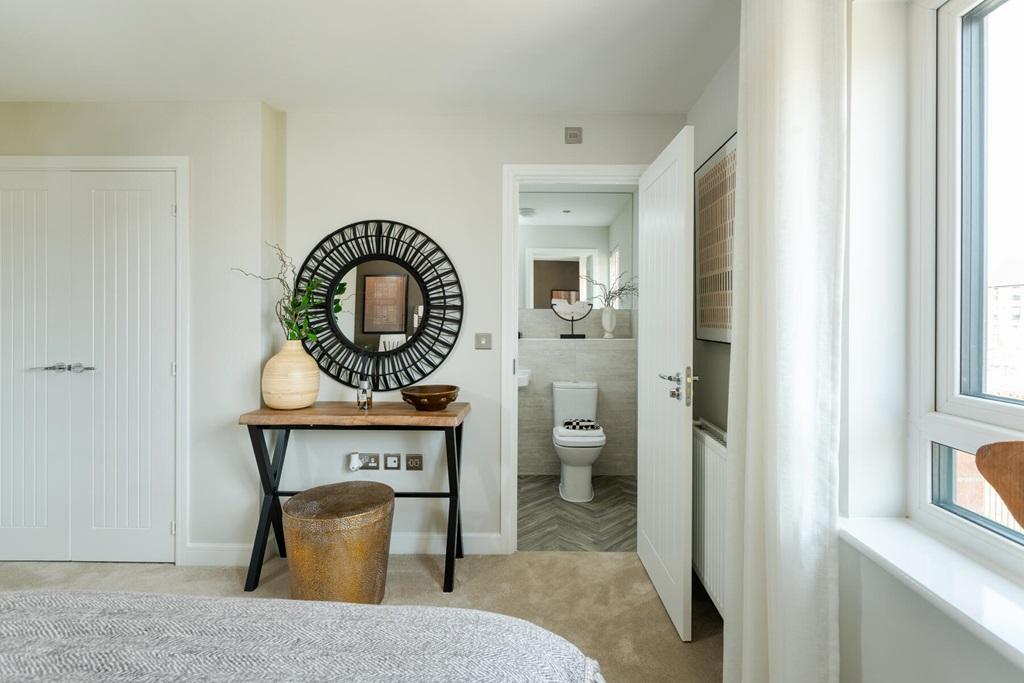 Bedroom 1 is equipped with an en suite