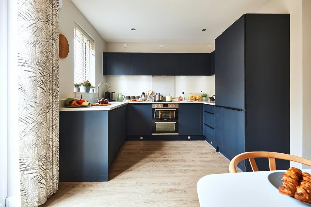 Enjoy a bright kitchen with patio doors to...
