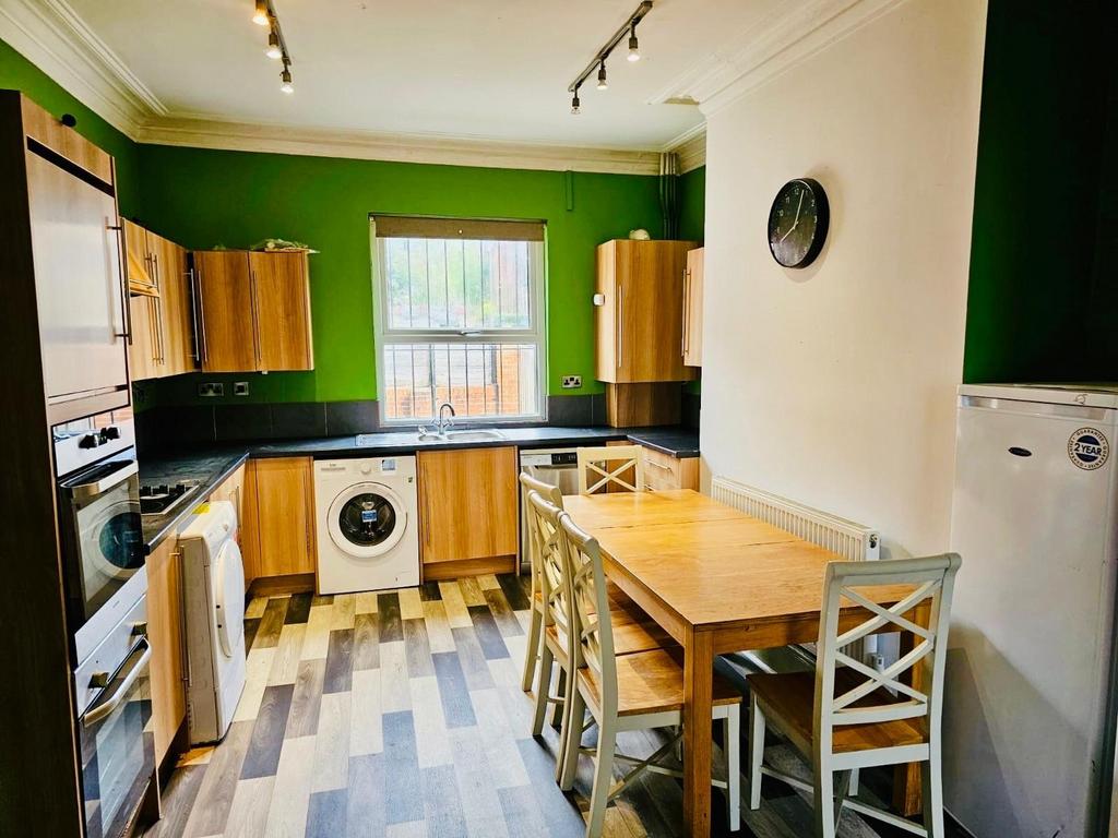 A bright and well-maintained kitchen featuring ...