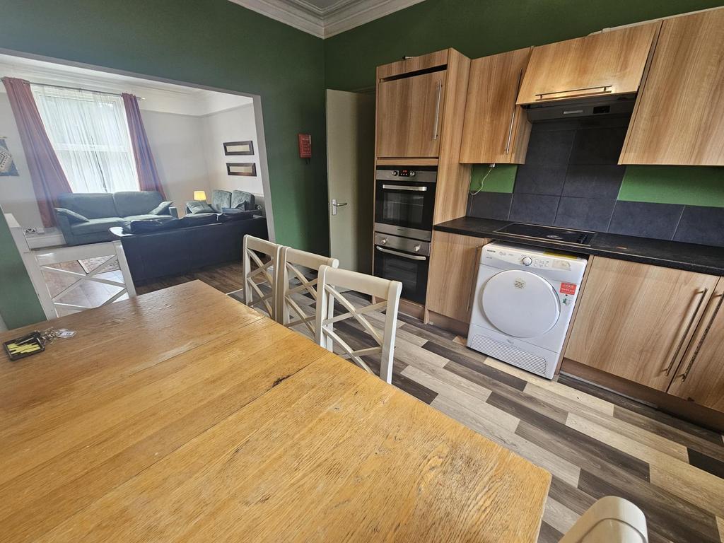 A bright and well-maintained kitchen featuring ...