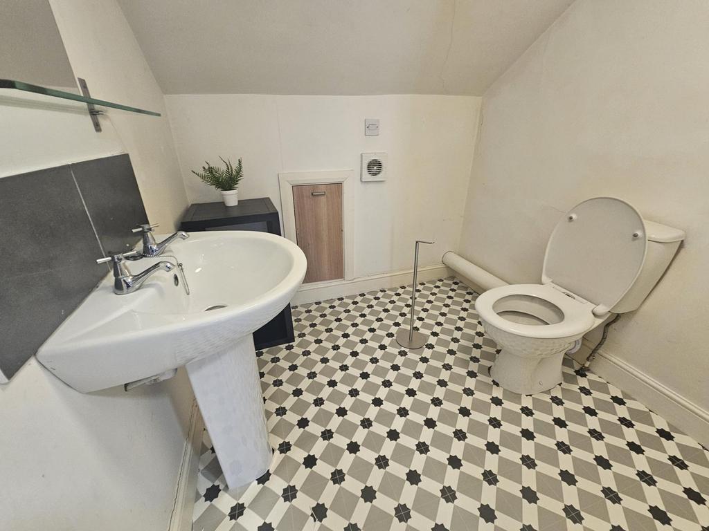 A clean and well-maintained bathroom featuring ...