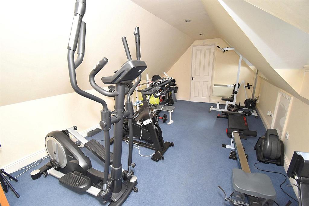 Gym above garage.jpg