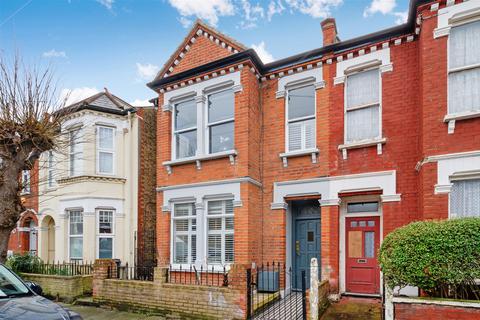 63 Warren Road, London, SW19 2HY