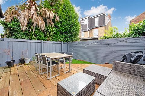 63 Warren Road, London, SW19 2HY