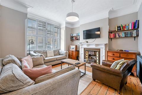 63 Warren Road, London, SW19 2HY