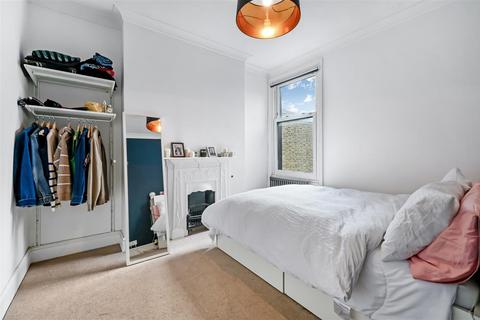 63 Warren Road, London, SW19 2HY
