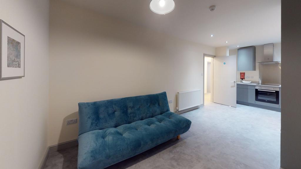 A bright and modern living room featuring a sty...