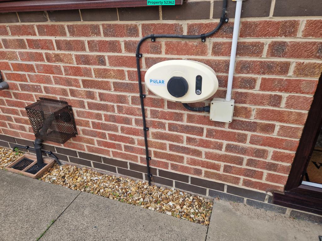 Electric car charger to front of house