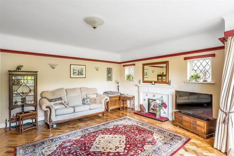 59 Woodbury Drive, Sutton, SM2 5RA