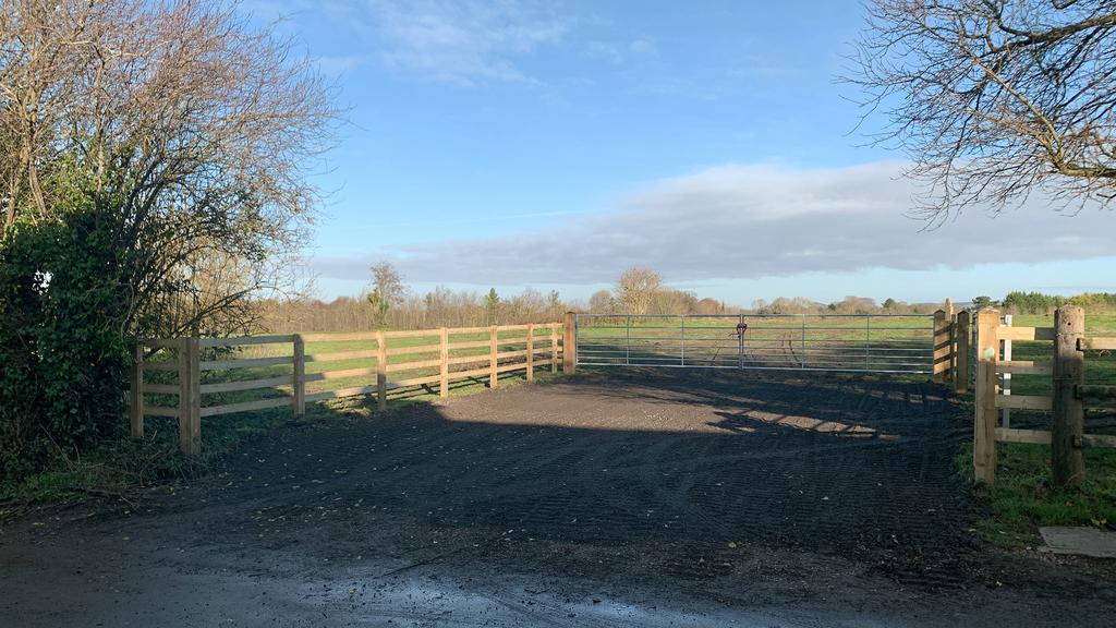 Direct gated access set-back from the road.