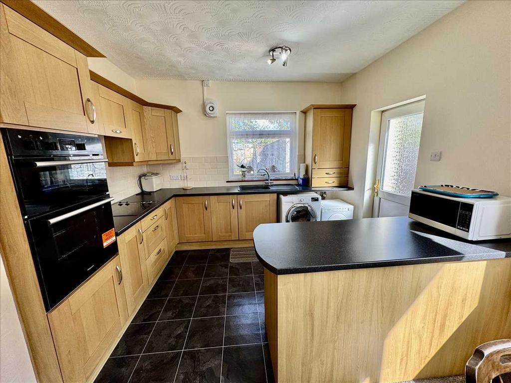 Adjoining KITCHEN